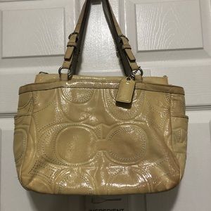 COPY - Coach shinny leather beige bag.